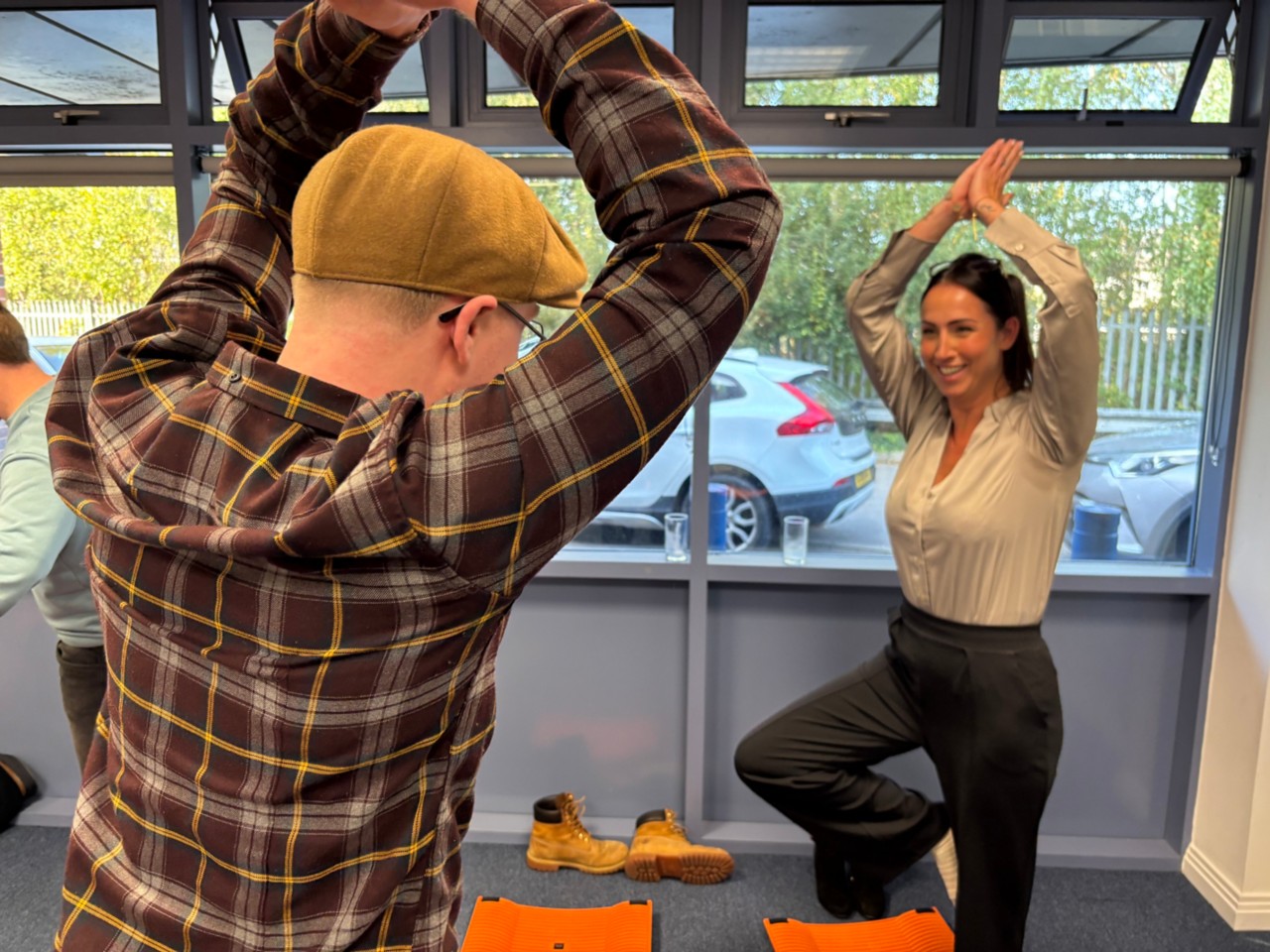 Wales group members trying one of the practical exercises led by Team Health Performance