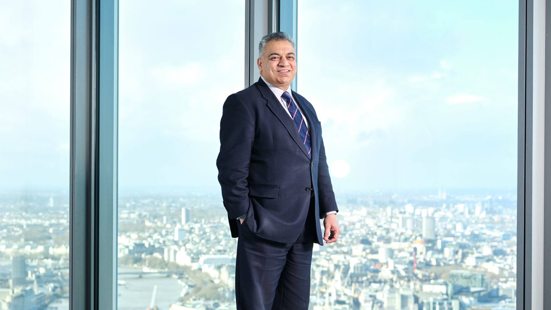 Shravan Joshi with London behind him