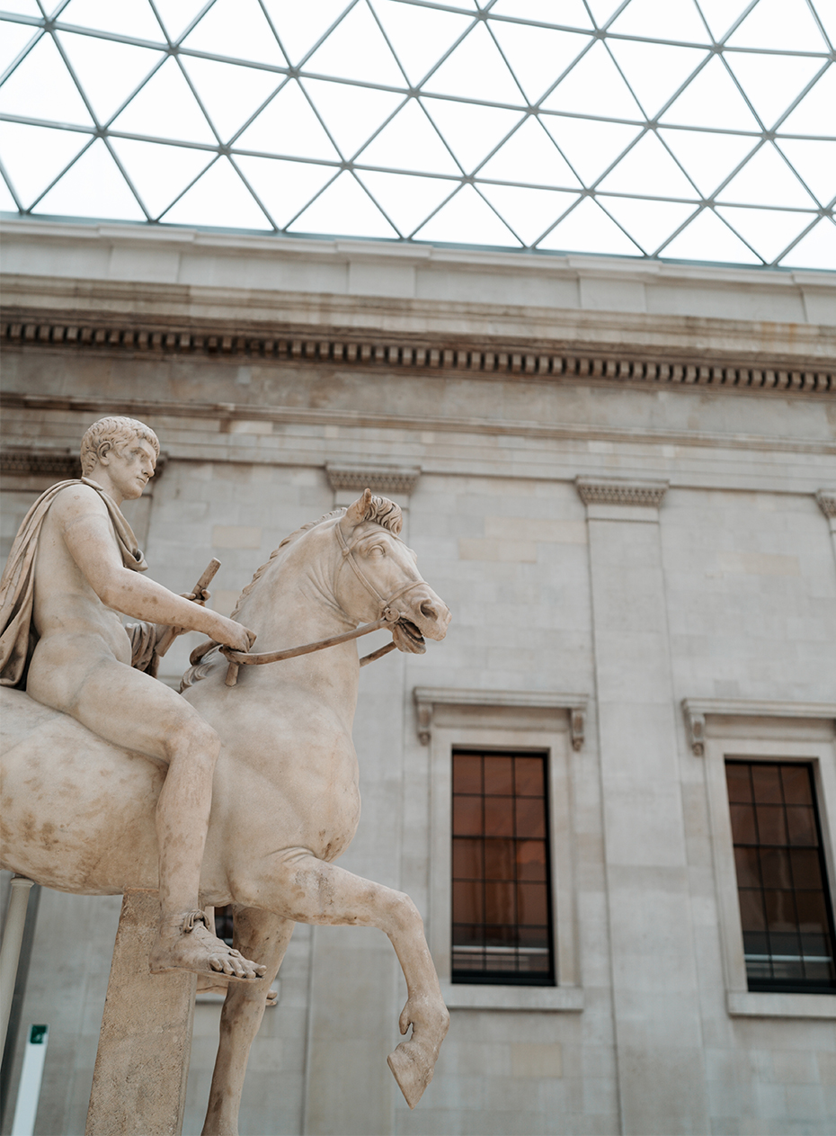 Marble statue of a man on a horse in the British Musuem