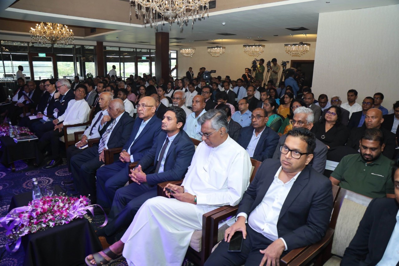 People sat down at a conference