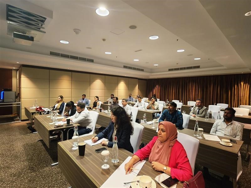 People sat down at a conference