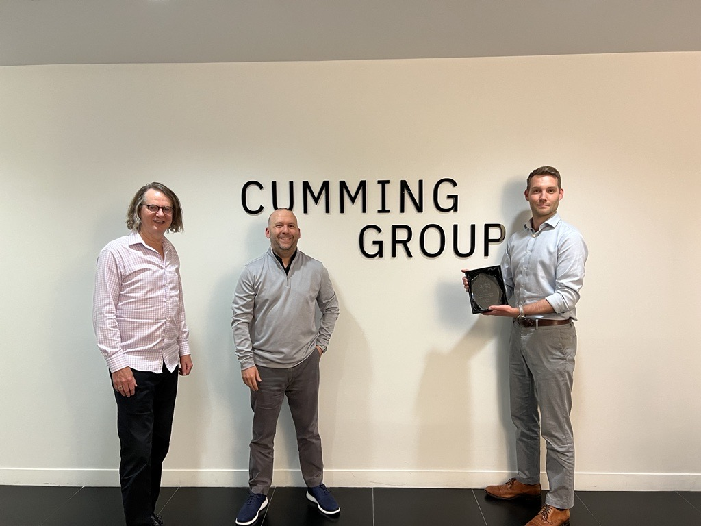 Construction Award Winner - Cumming Group: A group photoshoot of the winning team with the Construction Award 