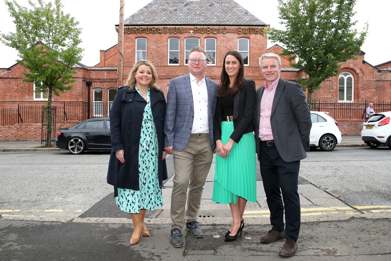 Group photo of the project team standing in front of Templemore Baths