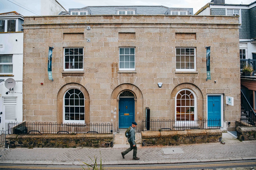 Photo of Bayspace St Ives, a fully accessible Grade II listed heritage building, framing dramatic views across St Ives harbour. 
